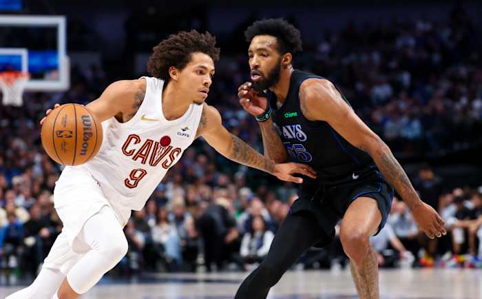 Dec 27, 2023; Dallas, Texas, USA; Cleveland Cavaliers guard Craig Porter Jr. (9) drives to the basket as Dallas Mavericks forward Derrick Jones Jr. (55) defends during the first quarter at American Airlines Center.